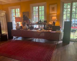 Living Room display flanked by a pair of Magnepan  Speakers...From a reviewer "These Magnepan speakers are just absolutely incredible! I don't think I could ever go to a box speaker again. The sound stage is just so wide and tall and deep. It's almost as if the singers and instruments are right before you and all around you..."