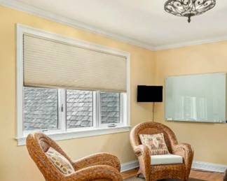 Pottery Barn Rattan Chairs, sold as a set available