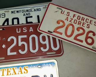 License plates from various duty stations