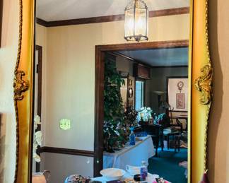 Gold sculpted, framed mirror