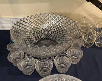 Punch bowl and various cups.
