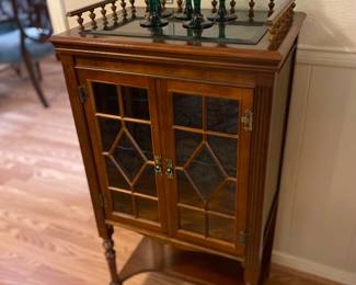 The cutest little lighted display cabinet!