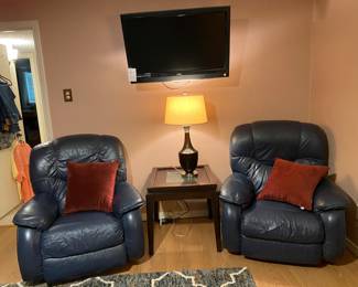 Pair of blue leather recliners