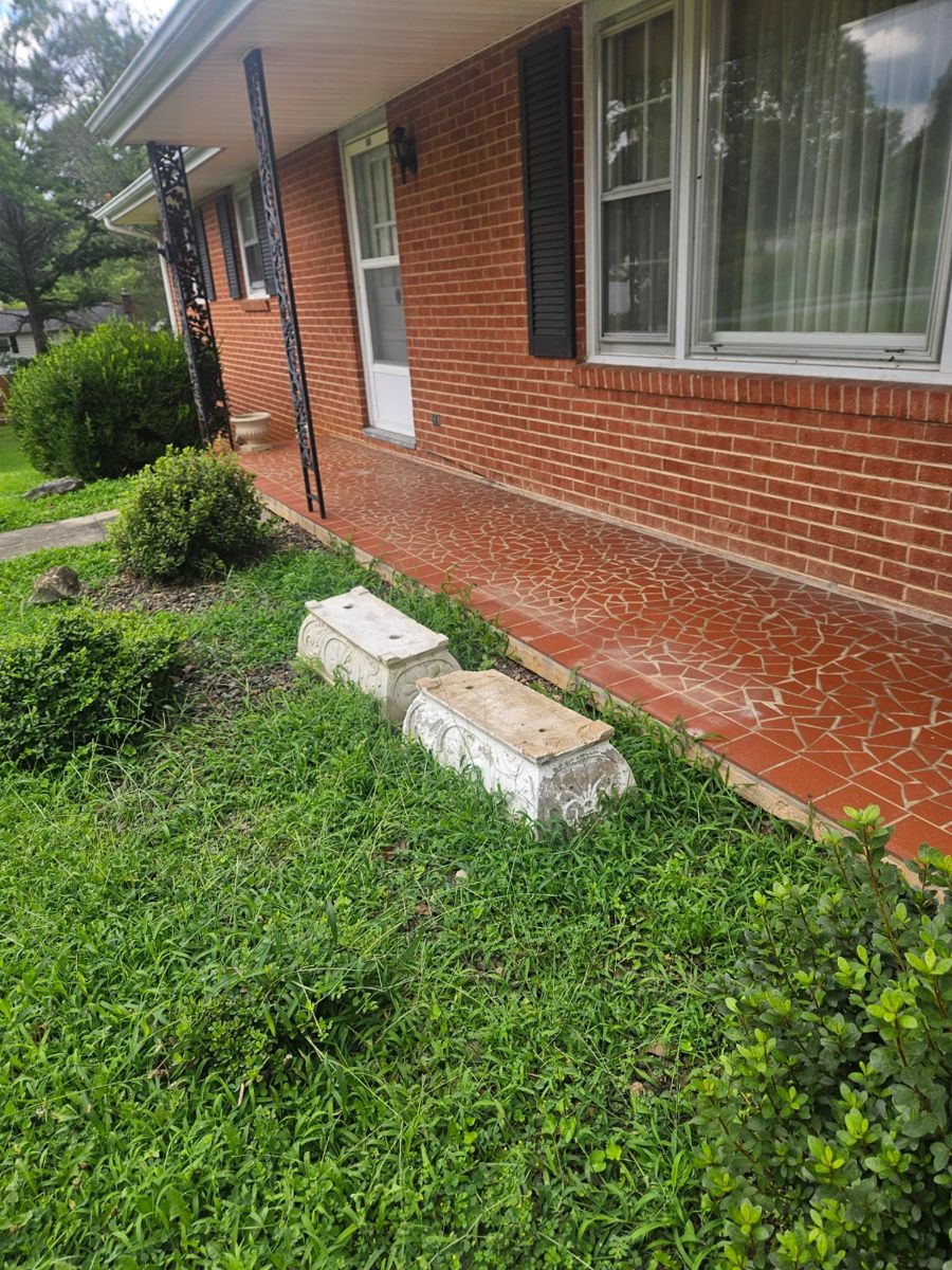 Concrete planters located front yard