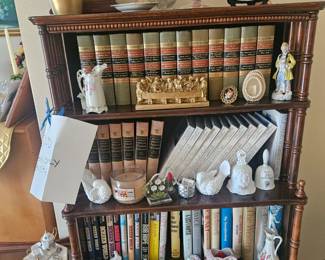 OWNERs keep bookcase. Items available for sale. upper level