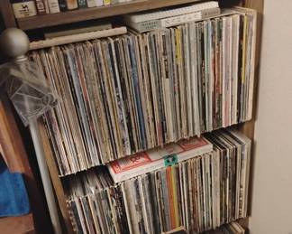 Over 1000 ---One Thousand LP records from the 1950s thru 1970s. Lots of jazz and big band and early rock