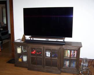 LARGE FLAT-SCREEN TV, TV CABINET, CDs & DVDs