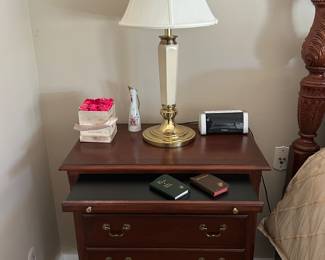Thomasville Bedside stand with pull out tray. 