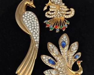 Vintage peacock brooches