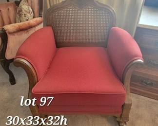 Antique cane back walnut upholstered rocker