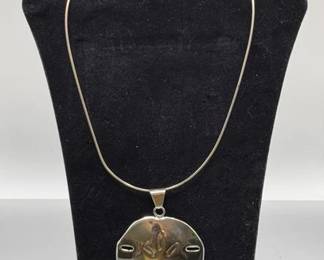 Sterling silver sand dollar necklace