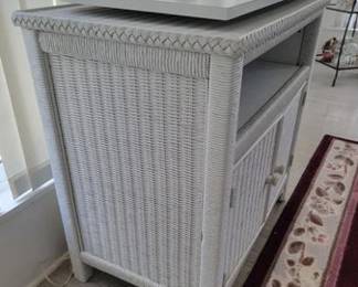 Wicker TV utility cabinet with swivel top