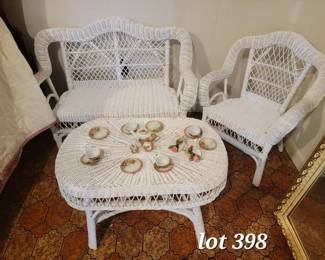 Child's 3 piece wicker set, second chair also available in auction. Hand painted vintage tea set.