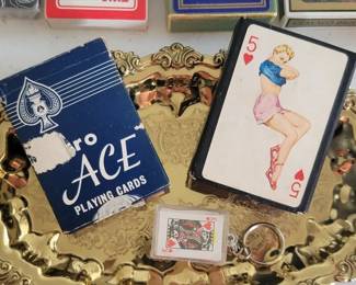 Vintage sets of playing cards and coasters