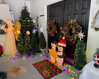 Door Wreaths with matching Garland's
Penguins several small Christmas trees