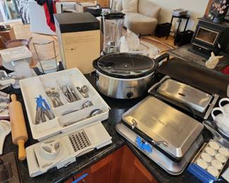 Cuisinart waffle maker, crockpot, flatware