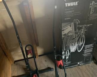 Upright bike racks and one Thule bike rack still in box