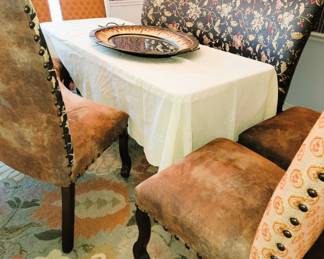 Dining room seating: 2 banquette chairs and 4 side chairs