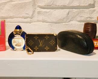 Perfumes and designer sunglasses - Mechanical clock