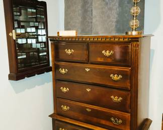 Gentleman's chest. Window treatments and lamps