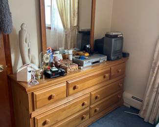 4 piece Oak BR set, mirror dresser with seven drawers, headboard bed and nightstand. 225 for the entire set.