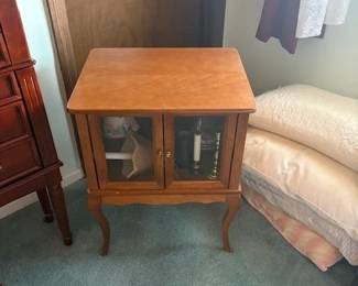 Glass front stand