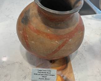 Large terra cotta polychrome bowl with red and yellow designs. Nayarit, CA. 300 AD.