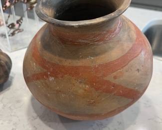 Large terra cotta polychrome bowl with red and yellow designs. Nayarit, CA. 300 AD.