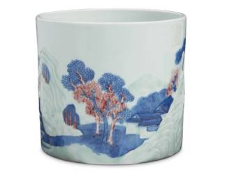 2175
A Chinese blue and white and copper red porcelain brush pot
Qing dynasty
With Ralph M. Chait Galleries sticker to underside
The copper red and celadon porcelain with carved relief landscape decoration
6.625" H x 7.25" Dia.
Estimate: $4,000 - $6,000
