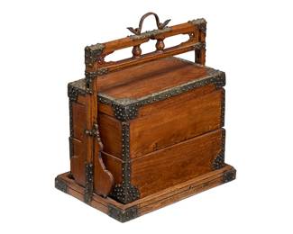 2315
A Chinese hardwood picnic box
19th century
Th two-compartment lidded box with iron mounts, set into a base with handle
22.25" H x 20.5" W x 14.5" D
Estimate: $300 - $500