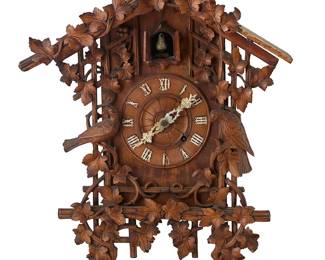 2380
A Black Forest carved wood cuckoo clock
20th century
The single movement clock with mounted plastic Roman numeral hour track and hands below a cuckoo bird, housed in a case profusely decorated with carved vines of ivy and three bird figures
22.25" H x 17.5" W x 9.5" D
Estimate: $200 - $400