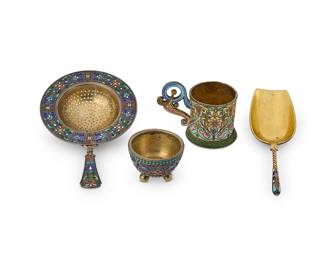2078
A group of European cloisonné items
Late 19th/early 20th century
Cup with kokoshnik mark for 88 zolotnik, assay master Ivan Sergeyevich Lebedkin, and possibly maker Fedor Ruckert; bowl marked for St. Petersburg, 88 zolotnik, and unknown maker; strainer marked for David Andersen, for sterling, monogrammed, and inscribed: Kristiania / Juli 7-1892
Each with enameled floral and filigree designs and vermeil gold wash over silver of various purities, comprising a Russian small handled cup and footed bowl, a Russian-style sugar spoon, and Norwegian tea strainer, personalized
4 pieces
Cup: 2" H x 2.625" W x 1.75" D; Strainer: 5" L x 3.125" W
Estimate: $700 - $900