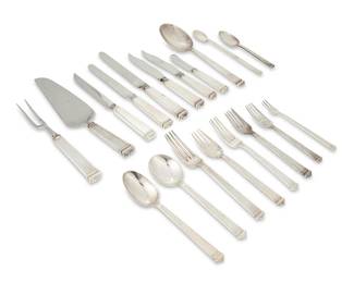 2019
A Tiffany & Co. sterling silver 'Hampton' flatware service
Circa 1934-1947, directorship of John C. Moore II
Each marked: Tiffany & Co. / sterling / M
Designed 1934, comprising 8 place knives (10.125"), 8 dinner knives (9.25"), 3 fish knives (8.5"), 5 smaller fish knives (8.125"), 8 butter spreaders (6.125"), 8 dinner forks (7.875"), 8 luncheon forks (7"), 8 salad forks (7"), 8 dessert forks (6.25"), 7 fish forks (7.125"), 8 cocktail forks (6"), 8 bouillon soup spoons (7.25"), 8 cream soup spoons (7.125"), 10 teaspoons (6.125"), 8 iced tea spoons (7.625"), 2 tablespoons (9.25"), 1 pie server (10.5"), and a carving set (9" and 8.75")
118 pieces
Weighable sterling: 150.6 oz. troy approximately
Estimate: $2,500 - $3,500
