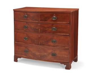 2387
A George III mahogany chest of drawers
19th century
The wood chest with later hardware and brass pulls, featuring five drawers, raised on bracket feet
38" H x 41.25" W x 20.5" D
Estimate: $700 - $900