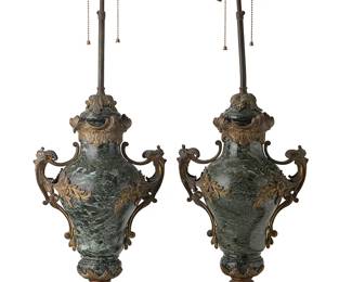 2261
A pair of Rococo-style bronze-mounted marble lamps
Early/mid-20th century
Each two-light urn-form marble lamp mounted with gilt-bronze acanthus-form mounts and gadrooning to base, electrified
2 pieces
Each: 33.5" H x 10.75" W x 7" D
Estimate: $600 - $800