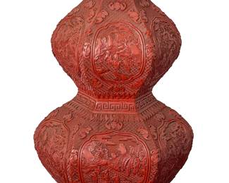 2074
A Chinese cinnabar lacquer vase
Late Qing Dynasty (1644-1912)
The hexagonal two-tiered vase of deeply carved cinnabar lacquered wood, the body depicting vignettes of the eight immortals in each register, with meandering motif trim and floating bat figures
23.25" H x 15.75" W x 13.25" D
Estimate: $4,000 - $6,000
