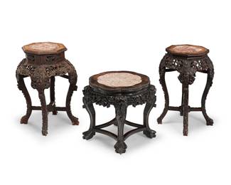 2324
Three Chinese carved wood and marble plant stands
Late 19th/early 20th century
Comprising three marble-topped stands, each with elaborately carved openwork floral and figural motif aprons, raised on four conformingly carved legs joined by a stretcher, consisting of two with octagonal tops and one with a scalloped top
3 pieces
Largest: 24" H x 15" Dia.; Smallest: 18" H x 20" Dia.
Estimate: $500 - $700