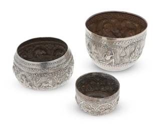 2284
Three Burmese sterling silver bowls
20th century
Each unmarked
Each round bowl with elaborate chased and repoussé motifs, each with a band of alternating human and animal figures
3 pieces
Largest: 4" H x 5.5" Dia.; Smallest: 2.5" H x 3.25" Dia.
Total weight: 18.1 oz. troy approximately
Estimate: $800 - $1,200