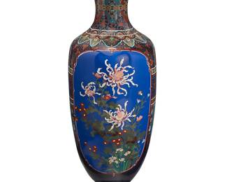 2068
A monumental Japanese cloisonné vase
20th century
The enameled copper floor-standing vase decorated with floral motifs, phoenix figures, and bats
48.5" H x 16.75" Dia.
Estimate: $1,500 - $2,000