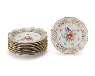 2412
A set of ten Schumann porcelain 'Chateau Dresden' dinner plates
Early 20th century; Germany
Each marked to underside: Schumann / Bavaria
Each with reticulated rims and transfer-printed floral motifs
10 pieces
Each: 10.375" Dia.
Estimate: $300 - $500