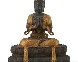 2350
A Japanese gilt-bronze figure of Kannon
20th century
The figure of the God of Mercy, depicted with gilt robe and adornments, seated atop a double lotus base
20.25" H x 16.5" W x 10.5" D
Estimate: $500 - $700