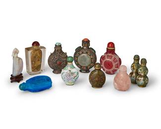 2367
A group of Chinese snuff bottles
20th century
Comprising two engraved or etched glass bottles, an interior-painted glass bottle, two carved hardstone bottles, three enameled bottles, and two hardstone-mounted silvered metal bottles
10 pieces
Tallest bottle: 3.25" H; Gourd: 2.75" L; Blue glass turtle: 3" L
Estimate: $700 - $900