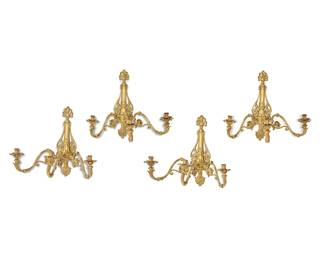 2259
A set of four French gilt-bronze sconces
19th century
Each wall-mounted sconce with three lights, the backplate cast with an anthemion above a reeded urn over a suspended palmette, issuing three scrolling arms terminating in floriform bobèches
4 pieces
Each: 27" H x 31" W x 19.5" D
Estimate: $1,000 - $1,500