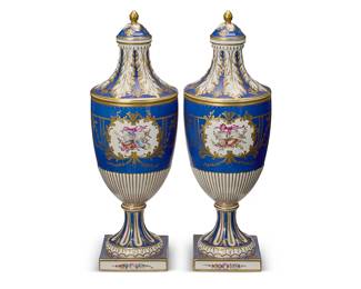 2408
A pair of Dresden porcelain covered urns
20th century
Each with underglaze blue Potschappel 'PS' monogram over: Dresden
Each baluster-form urn with flared, acanthus motif lid over a tapering body with painted musical reserves on a blue, gilt-highlighted ground with a gadrooned base, raised on a fluted support and square foot
2 pieces
Each: 15.5" H x 5.25" Dia.
Estimate: $400 - $600