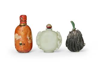2362
Three Chinese carved snuff bottles
19th/20th century
Comprising a gourd-form bottle, a two-handled jade urn-form bottle, and a coral ovoid bottle
3 pieces
Tallest: 3.125" H; Shortest: 2.25" H
Estimate: $800 - $1,200
