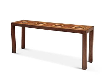 2382
A Neoclassical-style marquetry sofa table
20th century
The long thin table with marquetry inlaid diamonds within squares
25.5" H x 61.25" W x 15.75" D
Estimate: $300 - $500
