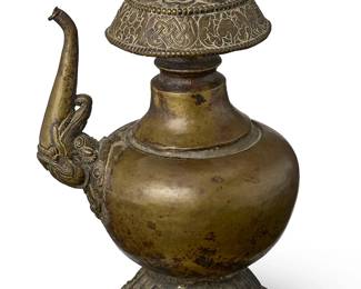 2121
An Asian metal bhumpa
19th century or later; Tibet or greater Vajrayana Diaspora
The tall footed and spouted vessel with zoomorphic and floral decoration
9.75" H x 7.5" W x 5.875" D
Estimate: $700 - $900