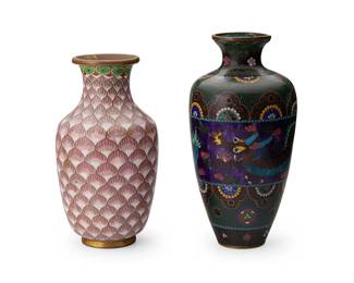 2063
Two Chinese cloisonné vases
20th century
Shorter stamped to underside: China
The enameled copper vases, comprising one with a pink floral pattern and another depicting a central dragon figure with floral motifs
2 pieces
Taller: 7.375" H x 3.875" Dia.; Shorter: 6.625" H x 3.625" Dia.
Estimate: $100 - $200
