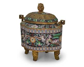 2140
A Chinese cloisonné enamel censer
20th century
The gilt copper and enamel censer with openwork foliate motifs to lid and finial, the body with opposed handles and floral motifs on the enameling, raised on guardian lion-form feet
15" H x 14" W x 9.5" D
Estimate: $500 - $700