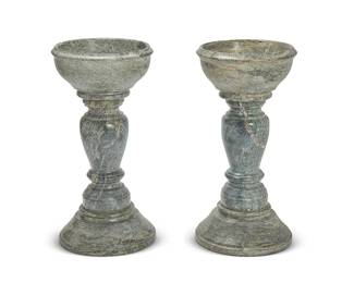 2237
A pair of green marble holy water fonts
20th century
The fonts with rimmed circular basins over baluster-form standards on spreading circular feet
2 pieces
Each: 32" H x 15.75" Dia.
Estimate: $400 - $600